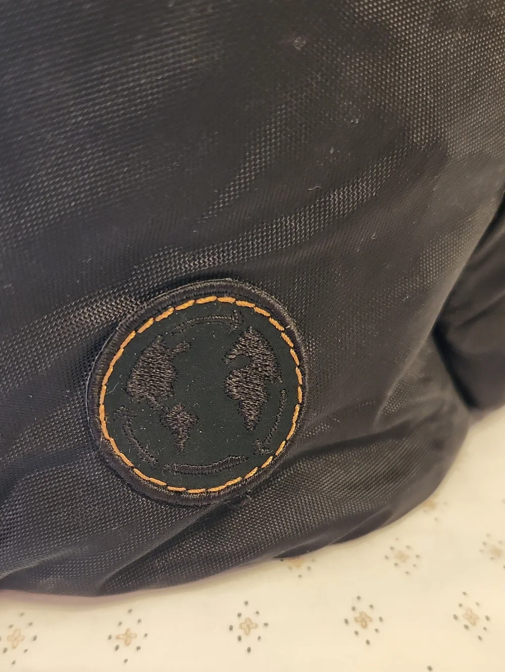 Tumi Voyager Harper Black Backpack with Tan Leather Accents